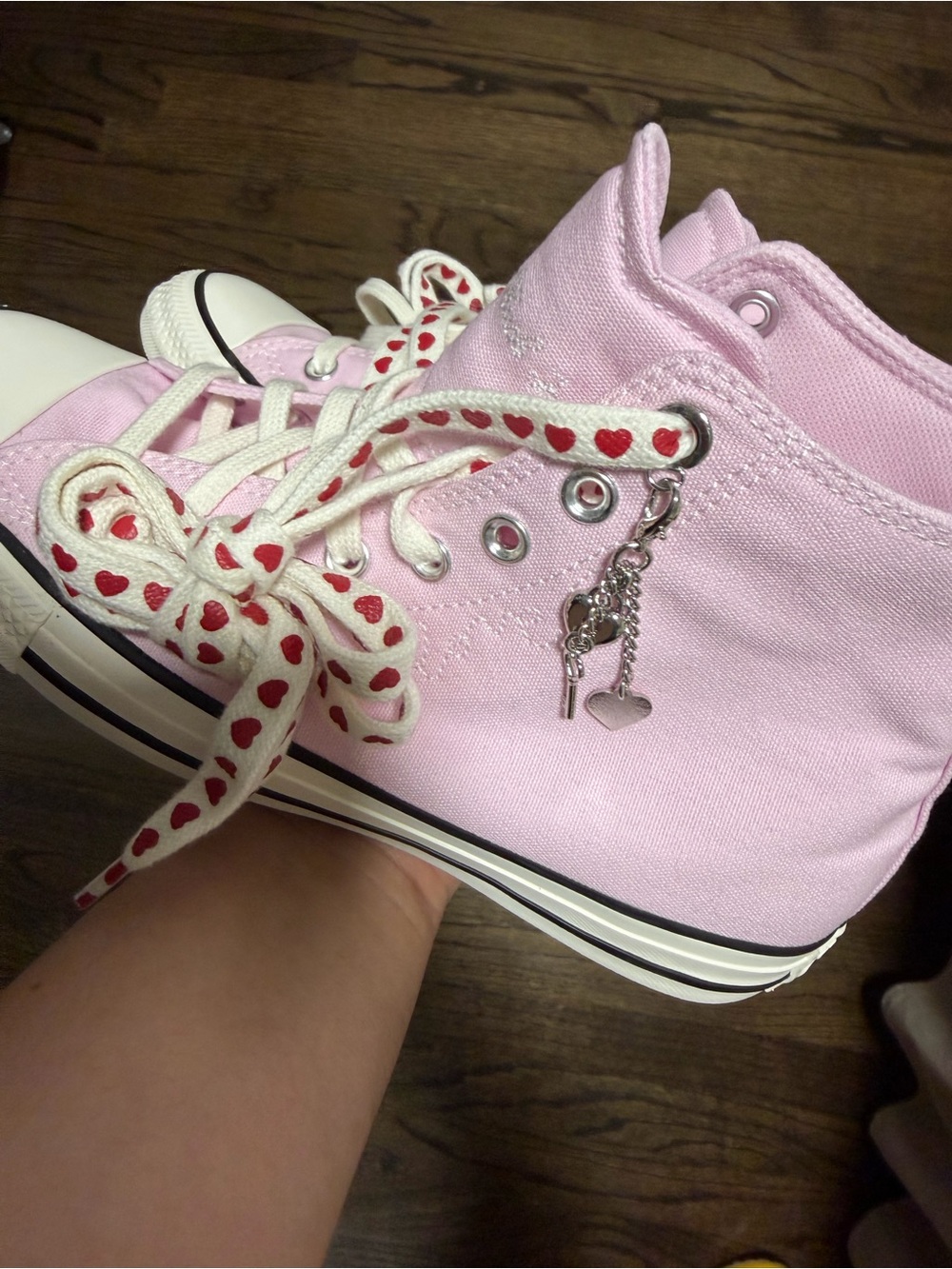 Pink High-Top Converse Sneaker with Heart Laces